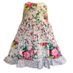 Invisible manikin view of the back side of the Baby Blue English Garden White Twirling Dress by Cool Blue Maui which has a white floral background with small pink roses, green leaves and large red and pink cabbage roses and a pink baby flower hem.