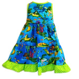 Invisible manikin view of the back side of the Baby Blue Turtle Town Twirling Dress by Cool Blue Maui which has a bright blue ocean background with swimming green sea turtles and a bright green polkadot hem.