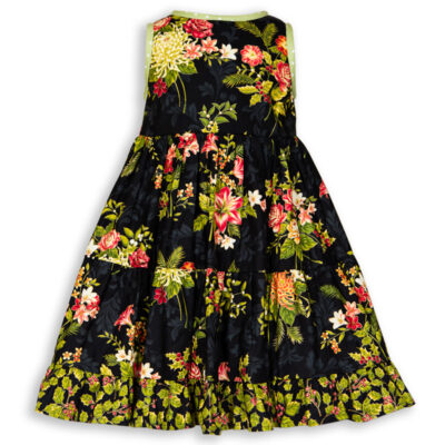 Back view of Holiday Bouquet Twirl Dress with the black background with roses, lilies, holiday flowers and green polkadot trim.